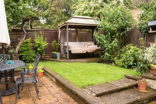 istock Swing chair in garden 1156079560
