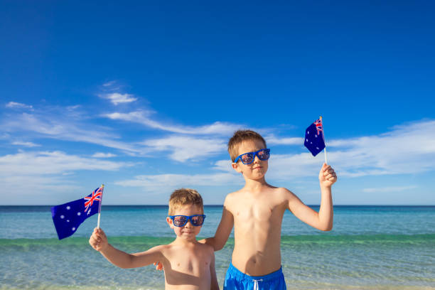 istock Kids holding Australian flags on Australia day 1156080660