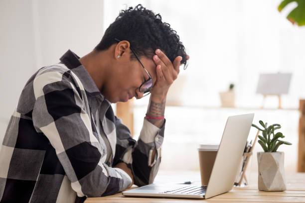 istock Black woman feels unwell have problems in work 1156082376