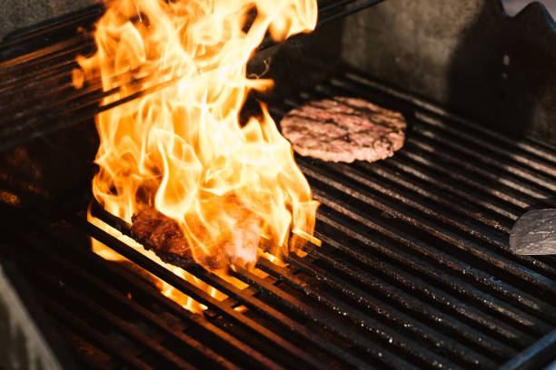 istock Burgers on the barbecue 1156082639