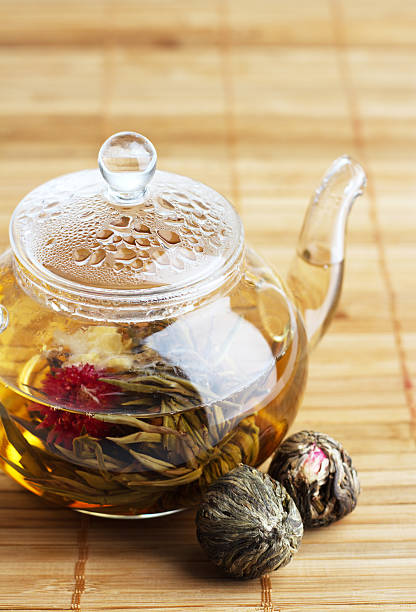 istock Glass teapot with fresh tea 115608463