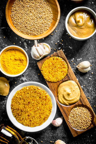 istock Different types of mustard with garlic. 1156085290