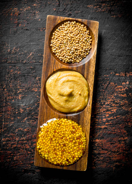 istock Mustard in a wooden stand. 1156086323