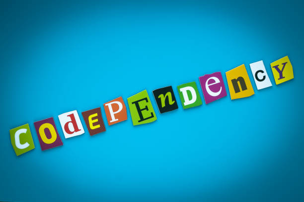 istock Codependency - word on blue background from colorful letters. Abstract card with an inscription. Text, headline, caption, heading on banner. Letter on bright illustration. Psychologic concept. 1156086360