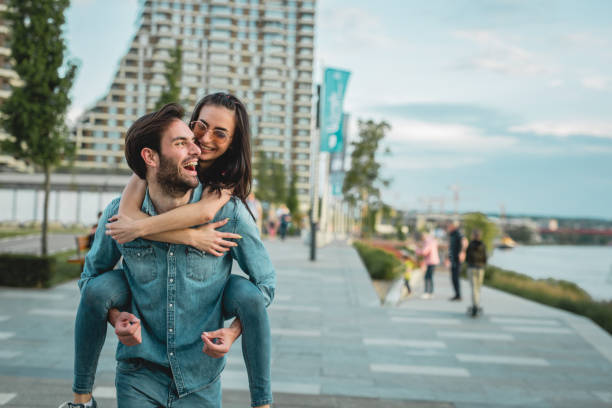 istock A young heterosexual couple is having fun outdoors 1156090735