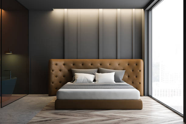 istock Gray master bedroom interior with bathroom 1156091124