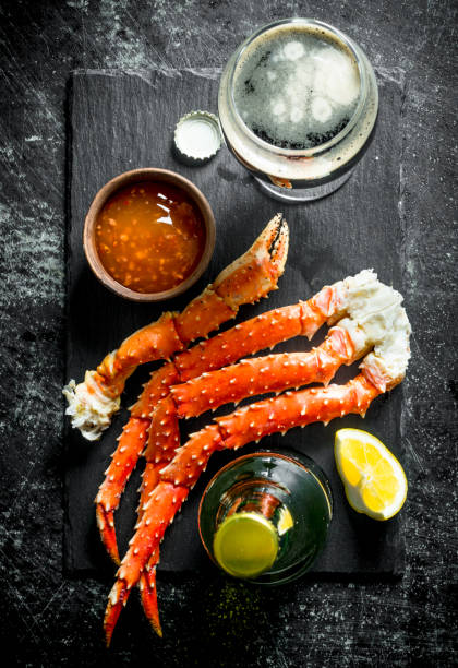 istock Crab with beer and sauce. 1156092378