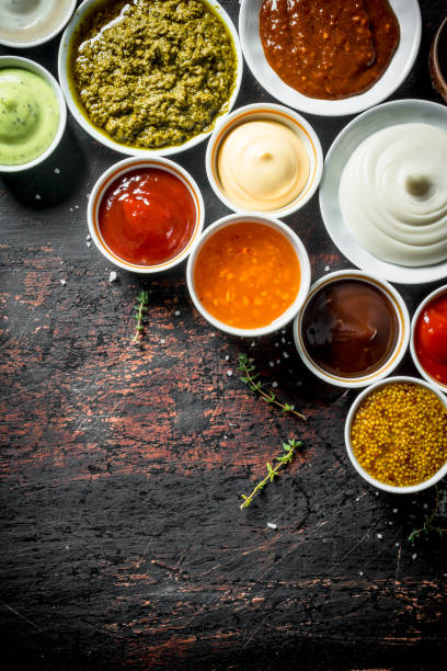 istock Different types of sauces in bowls. 1156092583