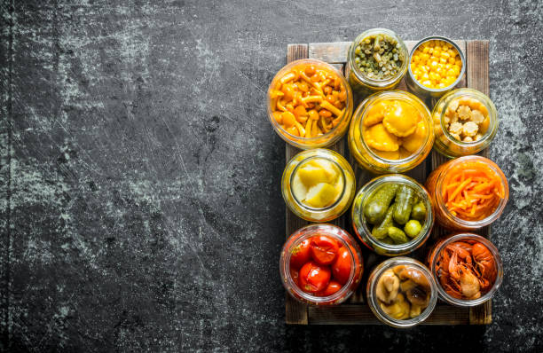 istock Jars with variations of pickled food on a tray. 1156096225
