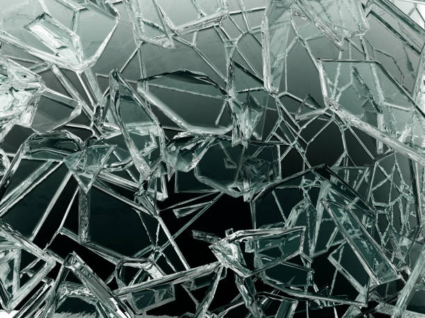 istock Pieces of shattered and broken glass 1156096381