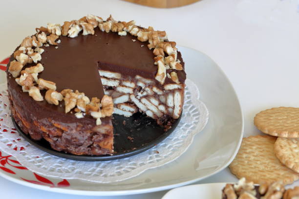 istock Cake without baking cookies and chocolate. Decorated with walnut crumbs. 1156097414