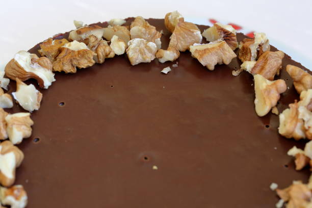 istock Cake without baking cookies and chocolate. Decorated with walnut crumbs. Close-up. 1156097444