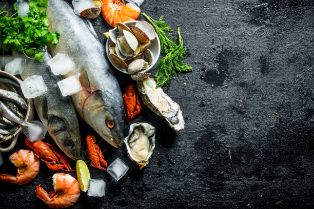 istock Raw fish with crayfish, shrimp and oysters. 1156097866