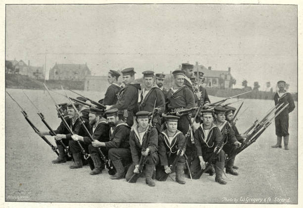 istock Royal Navy training in shore, Sailors form a rallying group 1156099819