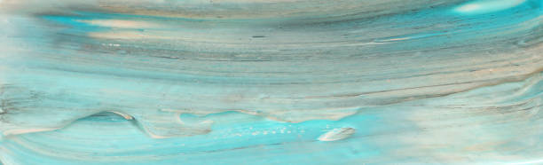 istock photography of abstract marbleized effect background. Blue, mint and white creative colors. Beautiful paint. banner 1156100311
