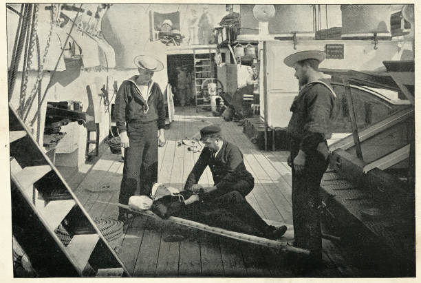 Ambulance drill on board HMS Tartar, Royal navy crusier Vintage photograph of Ambulance drill on board HMS Tartar, Royal navy crusier, 19th Century warship photos stock pictures, royalty-free photos & images