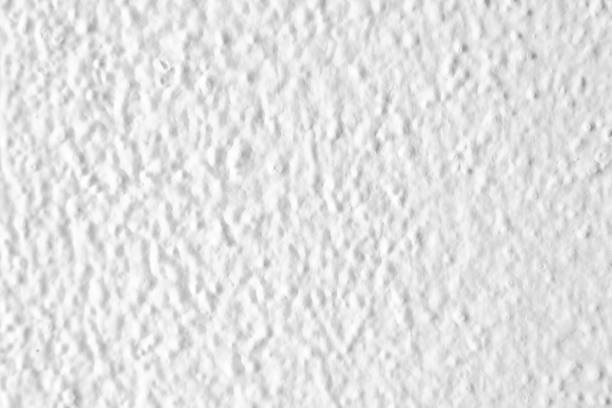 white popcorn ceiling full frame textured wall - artex imagens e fotografias de stock