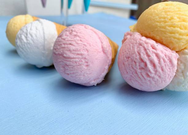 istock Ice cream balls lying in a row 1156102731