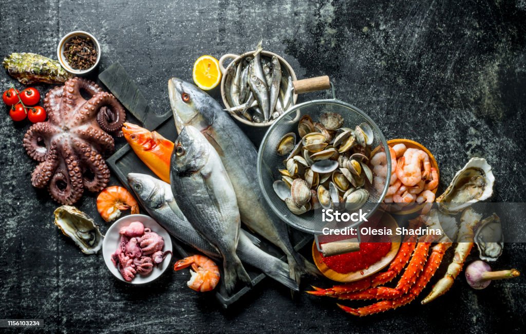 Fresh fish on tray with octopus, shrimp and crab. Stock Photo