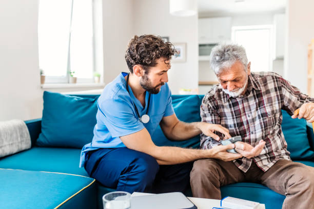 istock Blood Pressure Checking by Male Caregiver 1156106938