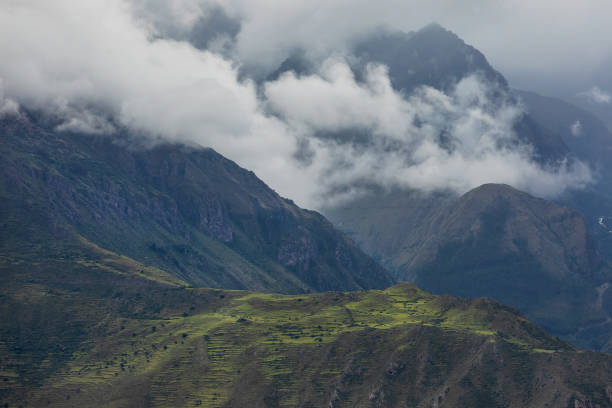 istock Heavy dramatic clouds over the Peruvian Andes. Peru. Districts of Cusco. South America 1156110050