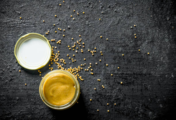 istock Mustard in a glass jar. 1156111294