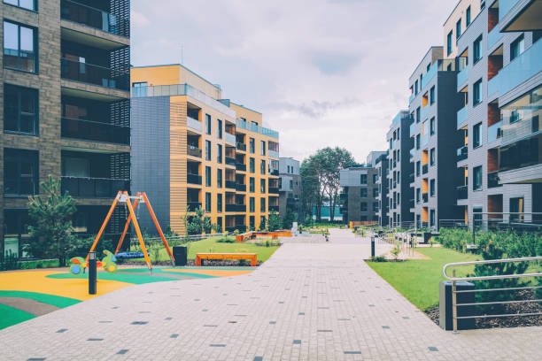 istock Modern apartment residential buildings quarter with benches 1156111479