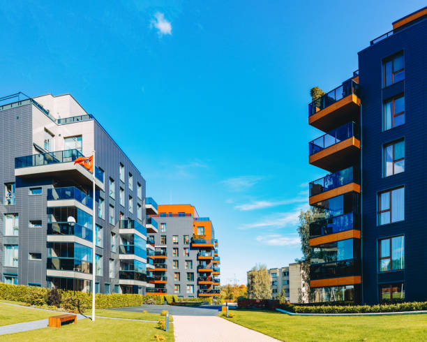 istock Modern architectural residential building quarter and flag 1156111605