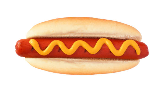 istock Hot dog with mustard, top view isolated on white 1156128873