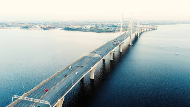istock cable-stayed bridge with high pylons and speeding cars 1156132360