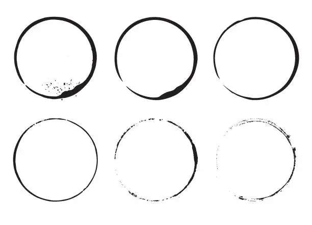 Vector illustration of Grunge design element ink circles. Set of cofee ring stains. Black round frames on a white background.