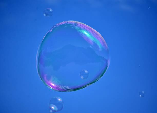 istock Soap bubbles on blue sky background in gdynia 1156139335