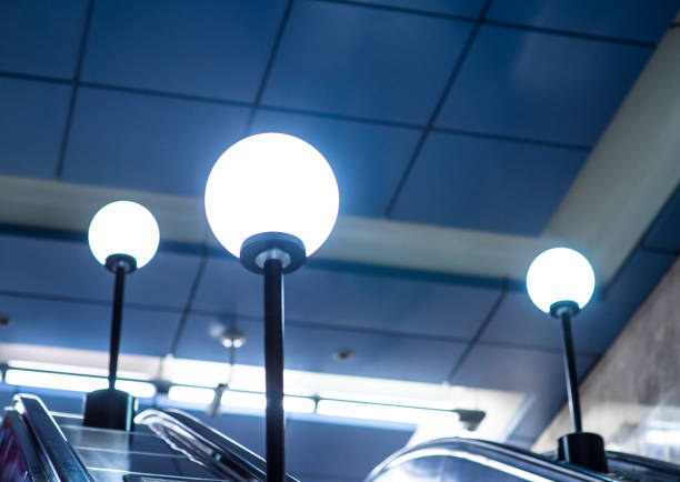istock Fluorescent round lamps line at metro station 1156140461