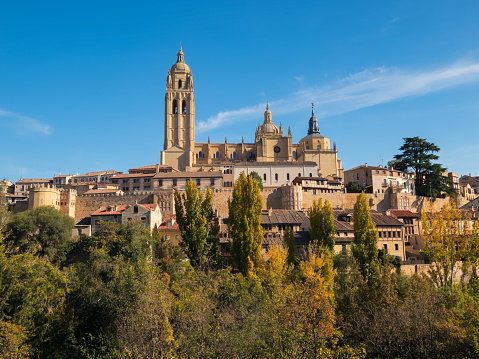 Autumnal view of the city of Segovia in Spain. Cathedral and historic buildings during the day