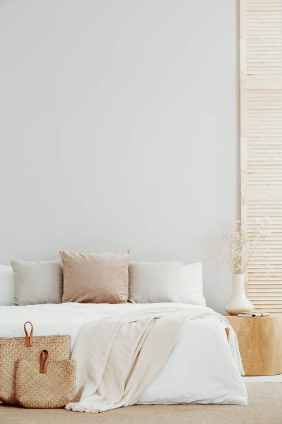 istock Copy space on empty wall of trendy bedroom interior 1156144831