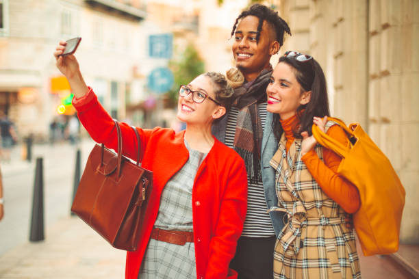 istock Friends are having fun in the city 1156144848