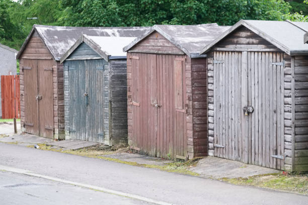 istock Wooden shed huts for storage in row with lock for owner security 1156145859