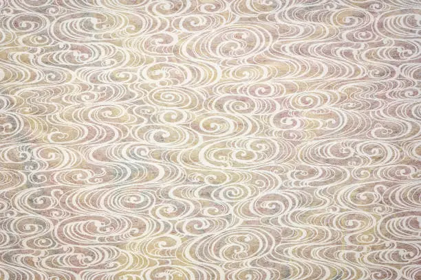 white Japanese Linen Tarasen Paper  with a swirl pattern against color marbled mulberry paper