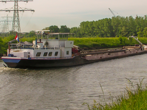 Inland navigation on the Meuse in the Netherlands, towards Beatrixhaven in Maastricht
