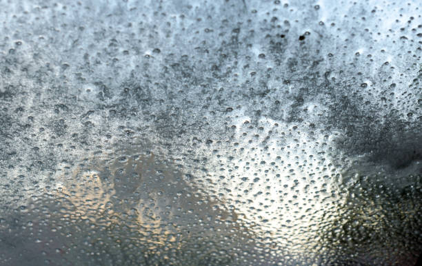 istock car wash water and foam texture on glass 1156156933
