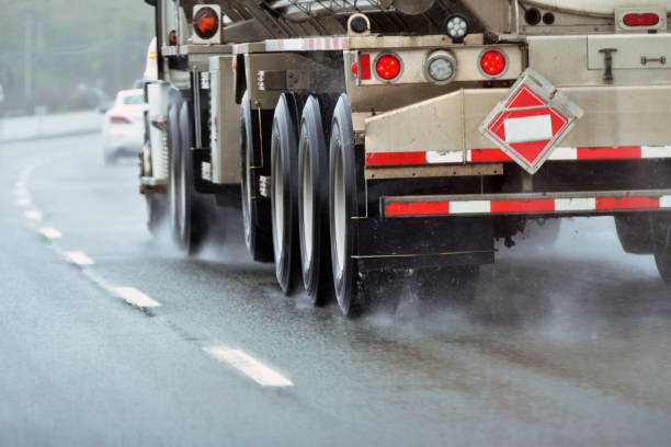 istock Moving Transport Truck on a Wet Highway 1156164780