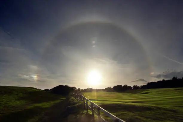 A beautiful sun halo (22 degree) with sundogs. Taken near Alnwick in Northumberland.
