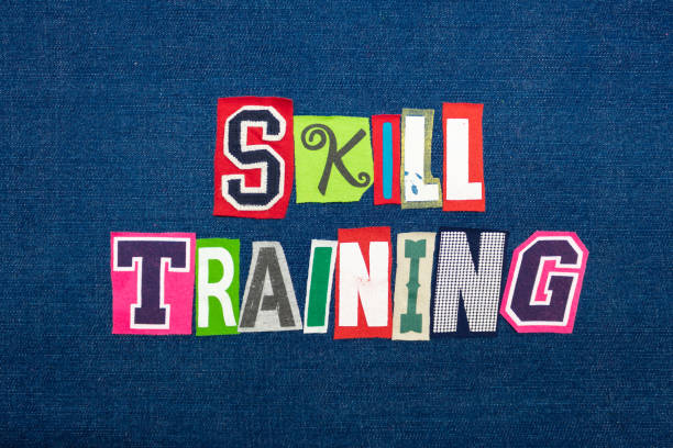 istock SKILL TRAINING collage of word text, multi colored fabric on blue denim, improvement and growth concept 1156170028