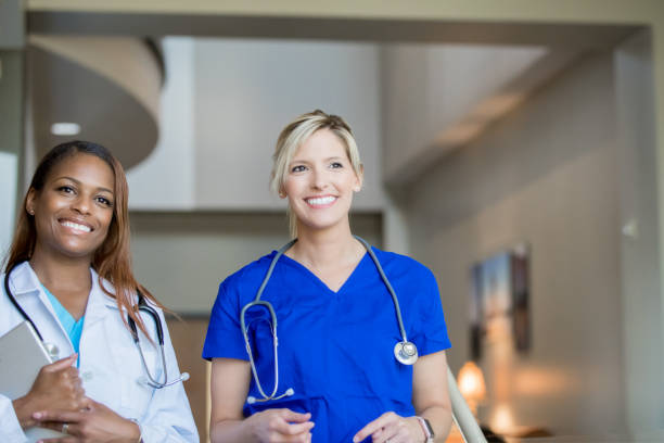 istock Diverse women working as doctors and nurses in modern hospital 1156172091