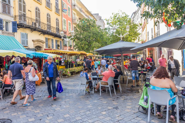 Toulon, France - 29th September 2017: People shopping on the Cours Lafayette market and sat outside cafes. The market is open every morning except Monday.