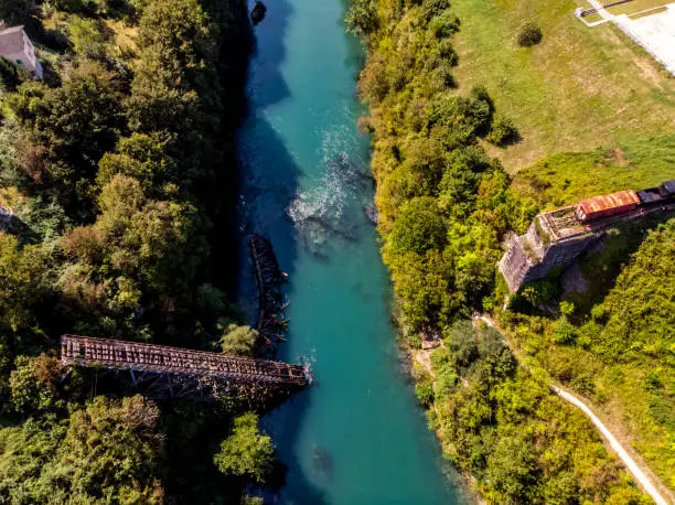 Photo of Drone view to the destroyed railway bridge in river Neretva during the war