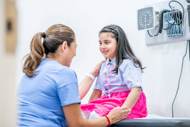 istock Little girl at doctor's office 1156198893
