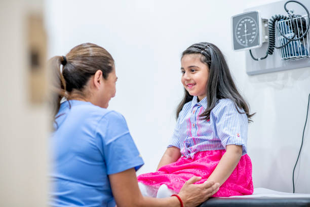 istock Little girl at doctor's office 1156198896