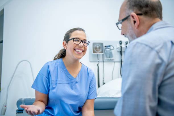 istock Senior adult at doctor's office 1156198947