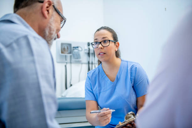 istock Senior adult at doctor's office 1156198955